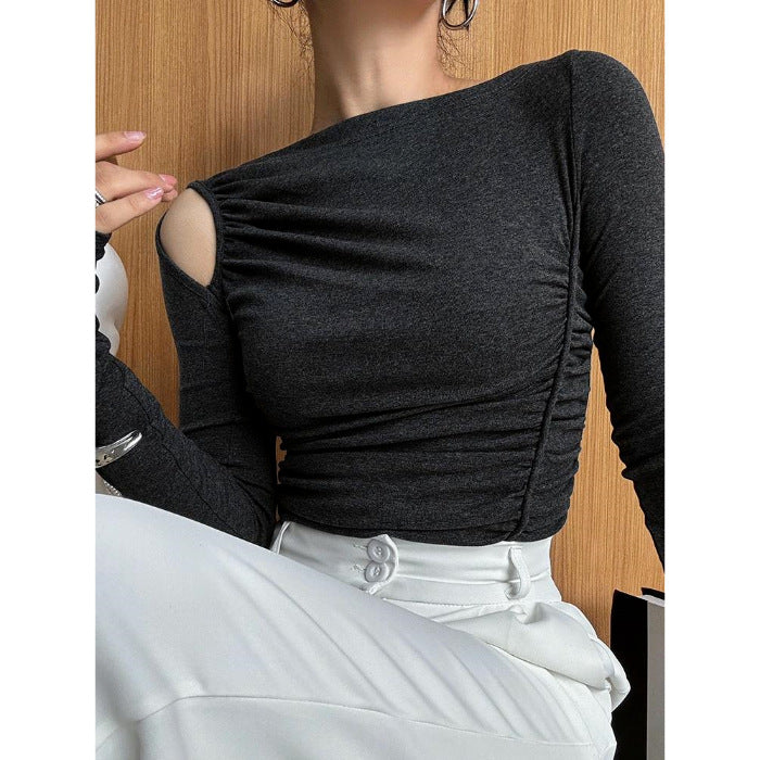 Women's asymmetrical long sleeve shirt with gathering on the side