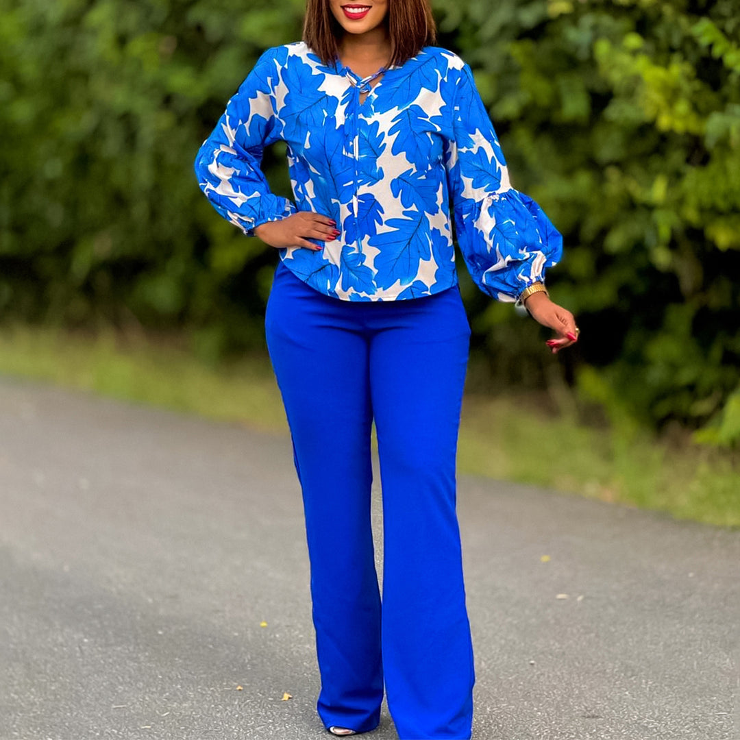 Women Elegant set consisting of a casual blouse with voluminous sleeves and classic pants Lune London