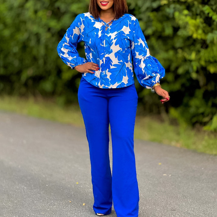 Women Elegant set consisting of a casual blouse with voluminous sleeves and classic pants Lune London