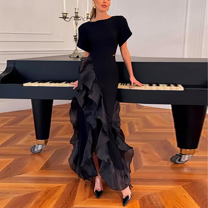 Women's elegant maxi dress with flowing ruffles and shimmering upper material Lune London