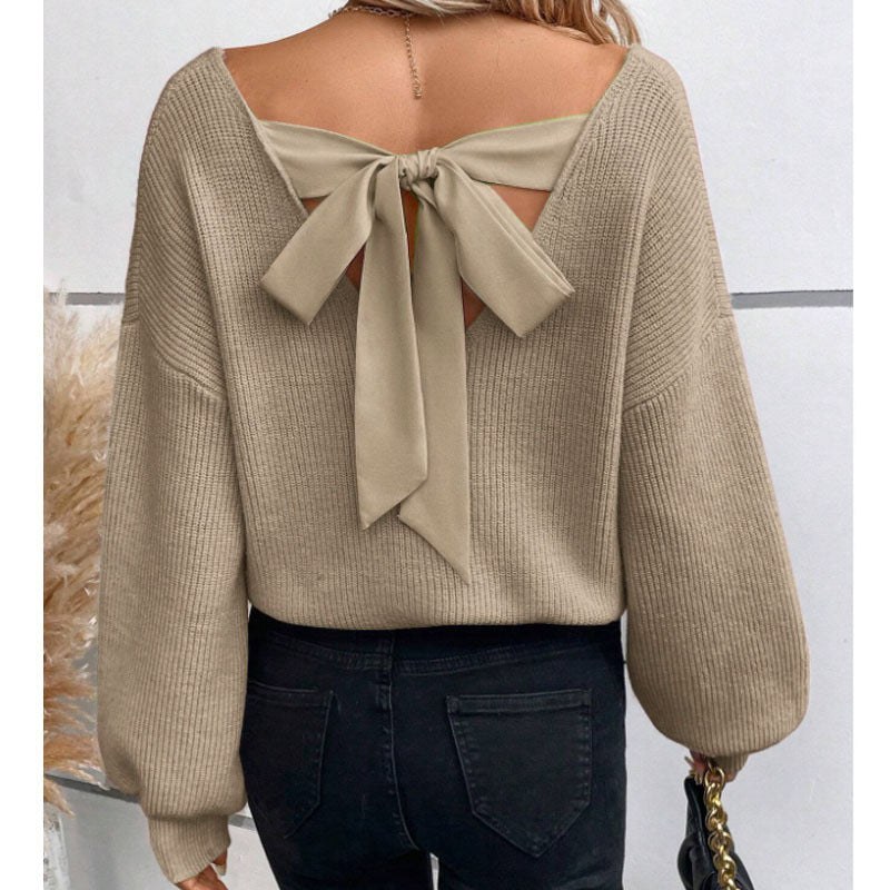 Pull en tricot pour femmes avec un décolleté en V profond et un détail de nœud décoratif Chic & Stil