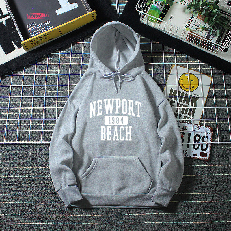 Women's hoodie with nostalgic Newport Beach lettering Chic & Stil