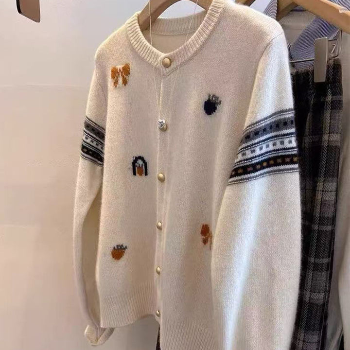 Knitted jacket for women with elegant appliqués and chic and stylish button details