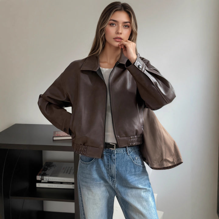 Oversized synthetic leather jacket for women with a modern look featuring a convenient zipper and elastic waist Lune London