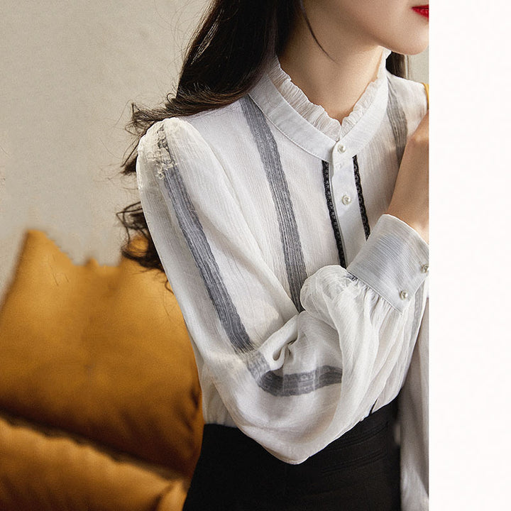 Elegant long sleeve blouse for women with ruffled collar and button details Lune London