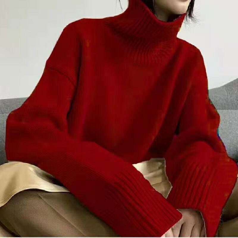 Pull col roulé pour femmes avec des manches larges et une structure en ribbing Chic & Stil