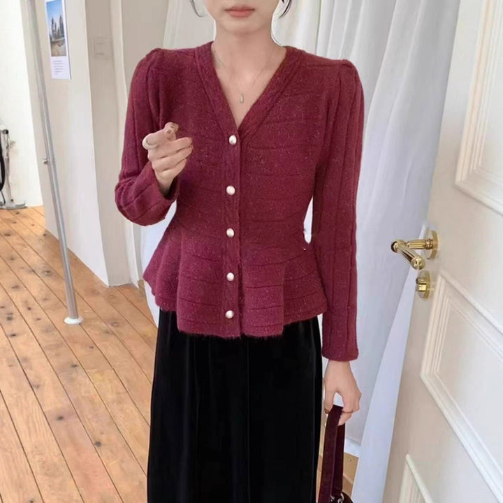 Ladies elegant cardigan with textured design and feminine puff sleeves Lune London