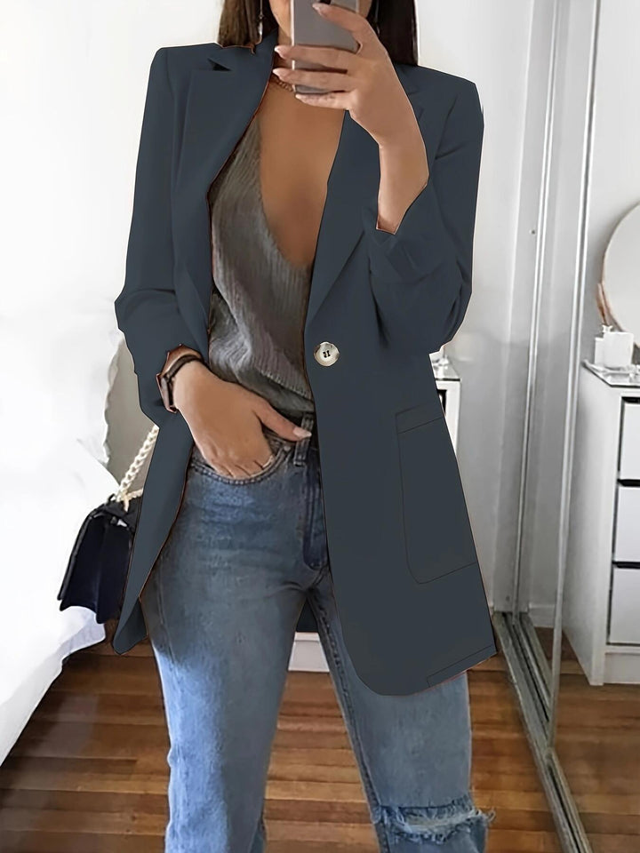 Elegant women's blazer jacket with shiny button details and spacious pockets Lune London