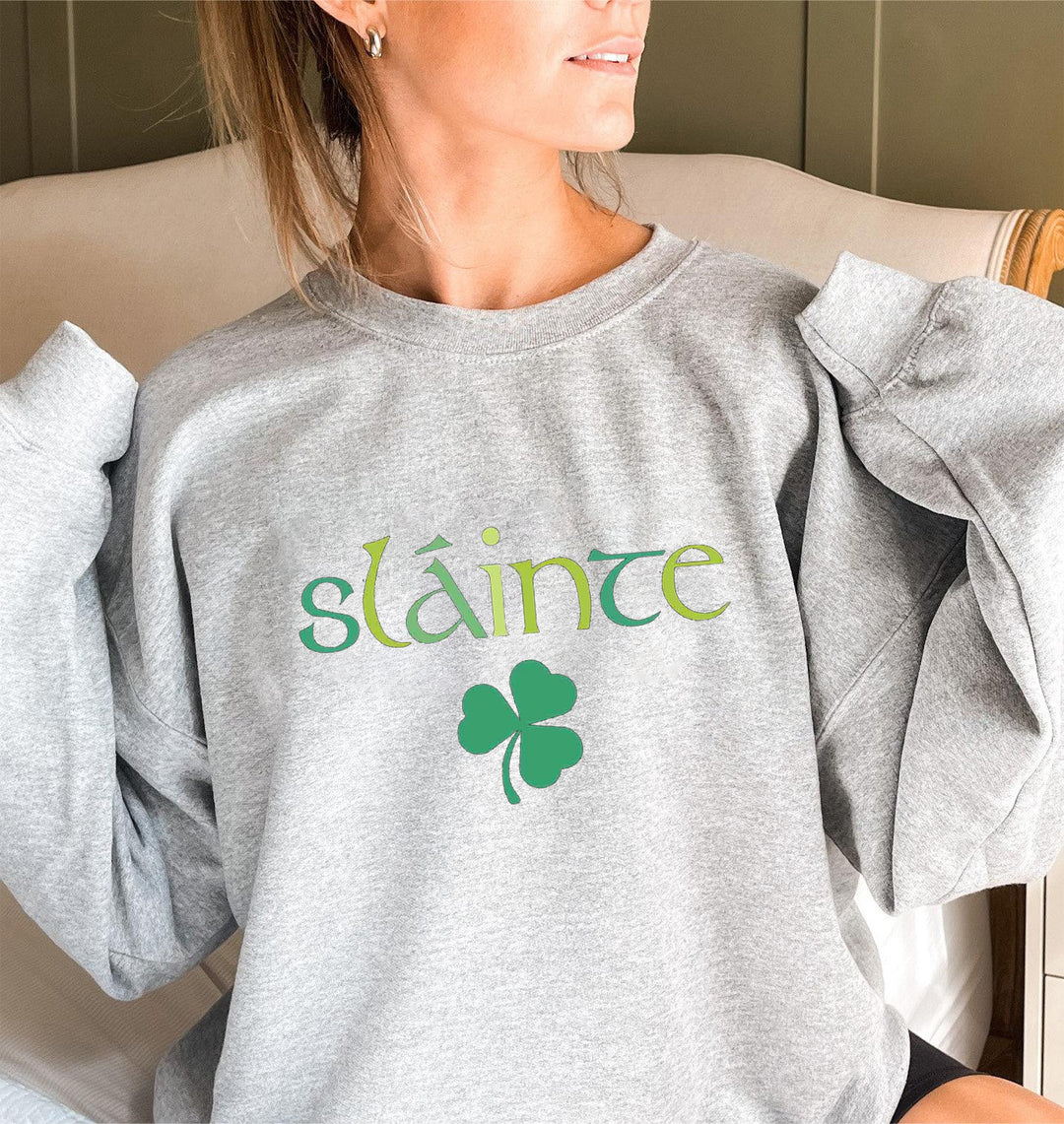 Sweat-shirt pour femmes avec des manches volumineuses et un design motivant Chic & Stil