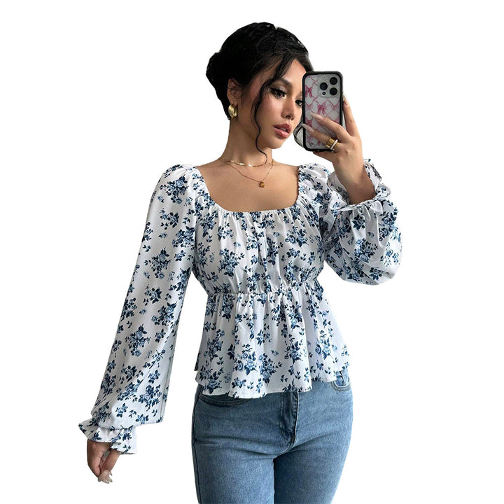 Women's blouse with floral design and voluminous sleeves Chic & Stil