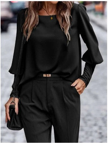 Elegant women's blouse with puff sleeve details and structured fabric Lune London