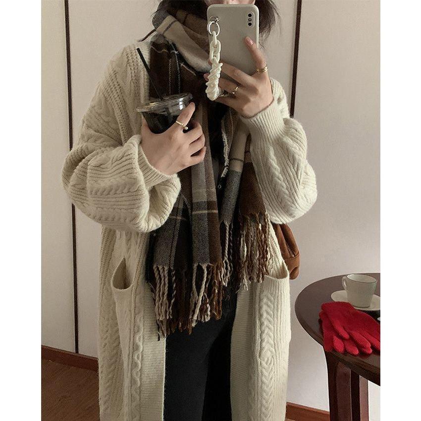 Ladies Thick Knit Cardigan with deep pockets and elegant Braid design Lune London