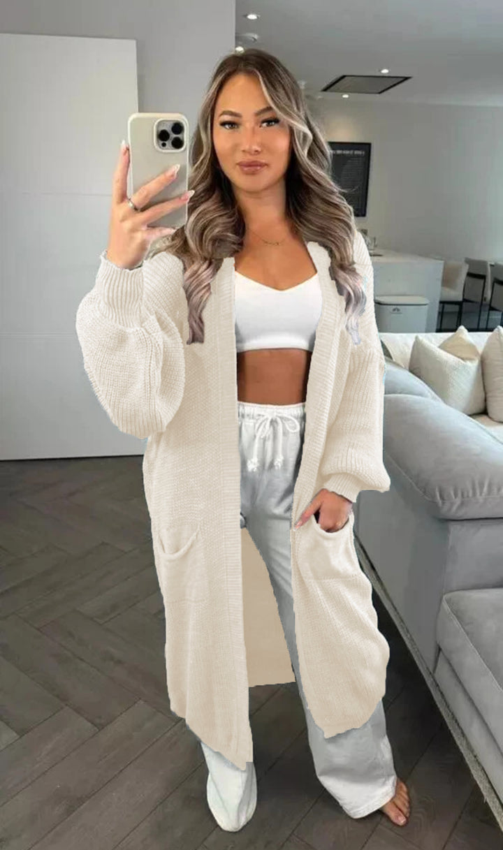 Casual knitted coat for women with deep pockets and open design Lune London