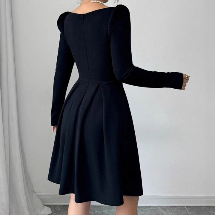Ladies Elegant Mini Dress with narrow square neckline and fine ruffle trim Lune London