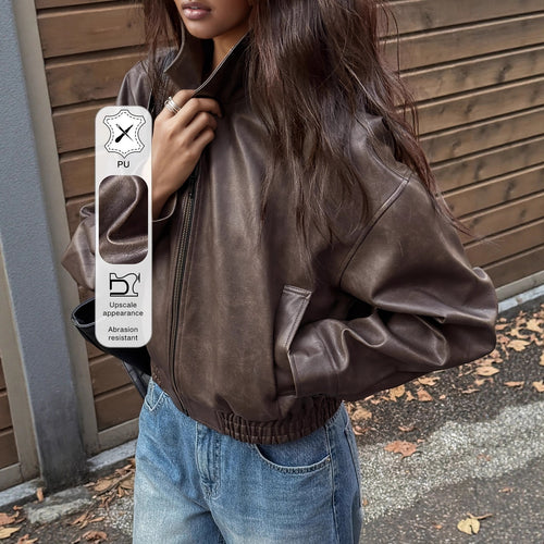 Oversized synthetic leather jacket for women with a modern look featuring a convenient zipper and elastic waist Lune London