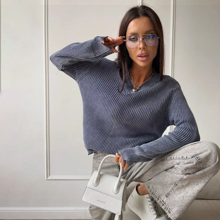 Thick knitted sweater for women with a trendy V-neck and worn elements Lune London