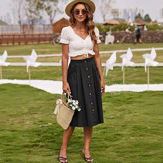 Midi skirt for women with button placket and practical pockets Lune London
