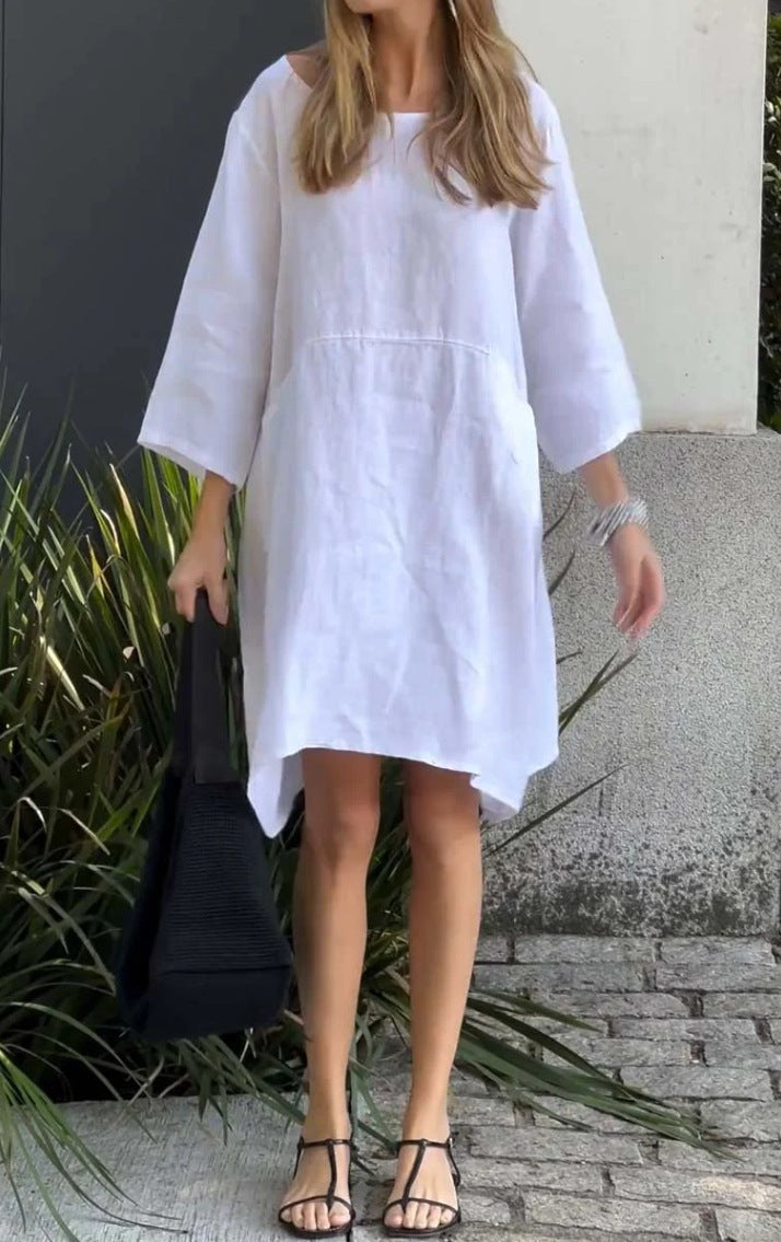 Casual linen dress for women with practical pockets and asymmetrical hem Lune London