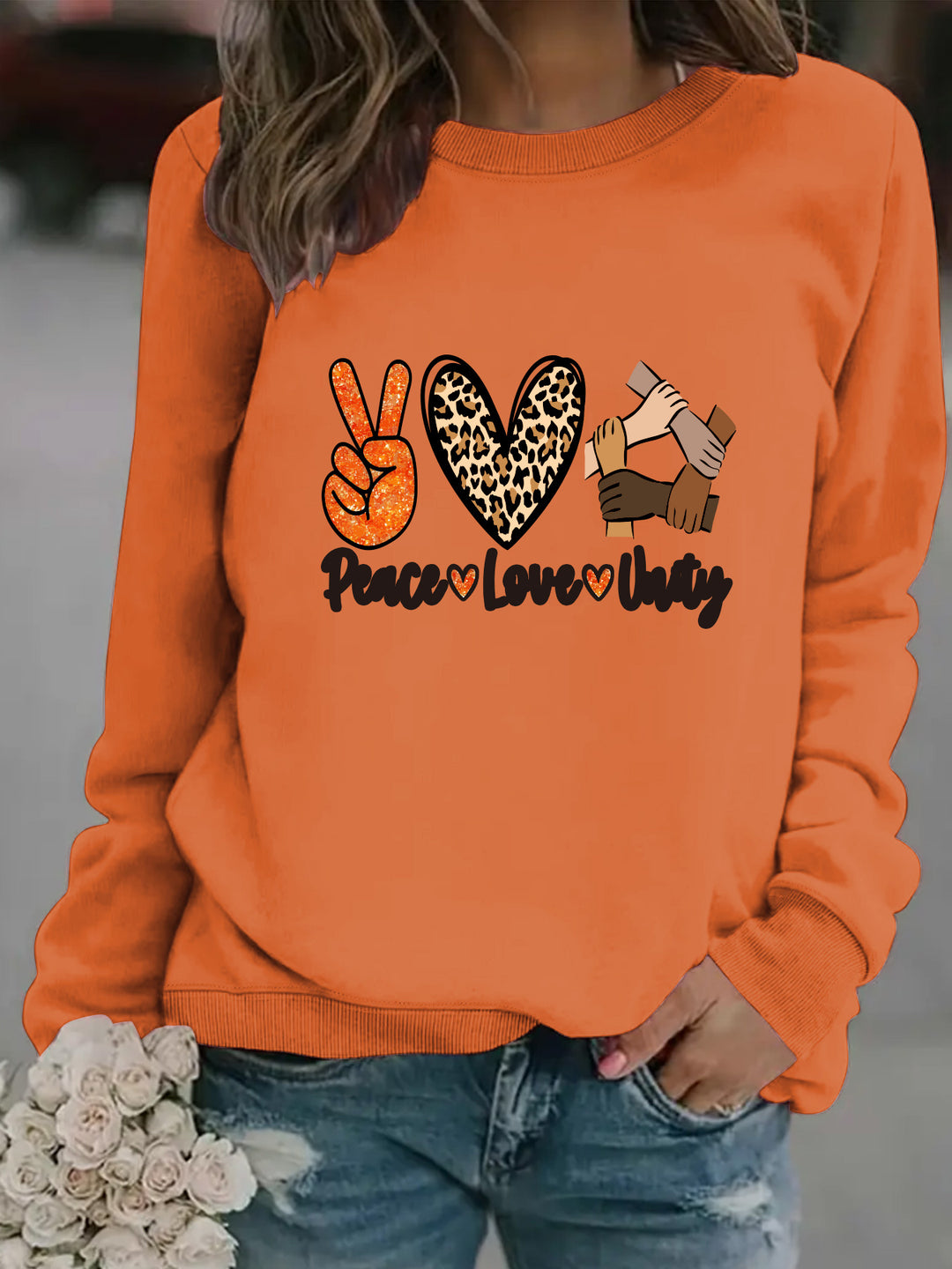 Sweatshirt pour femmes avec un design créatif Paix, Amour & Unité Chic & Stil