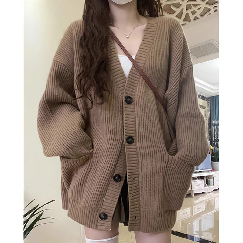 Ladies Large knitted cardigan with deep V-neck and practical pockets Lune London