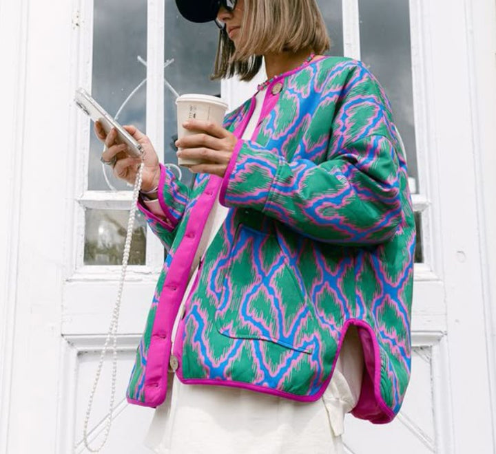 Trendy women's bomber jacket in ethnic chic style