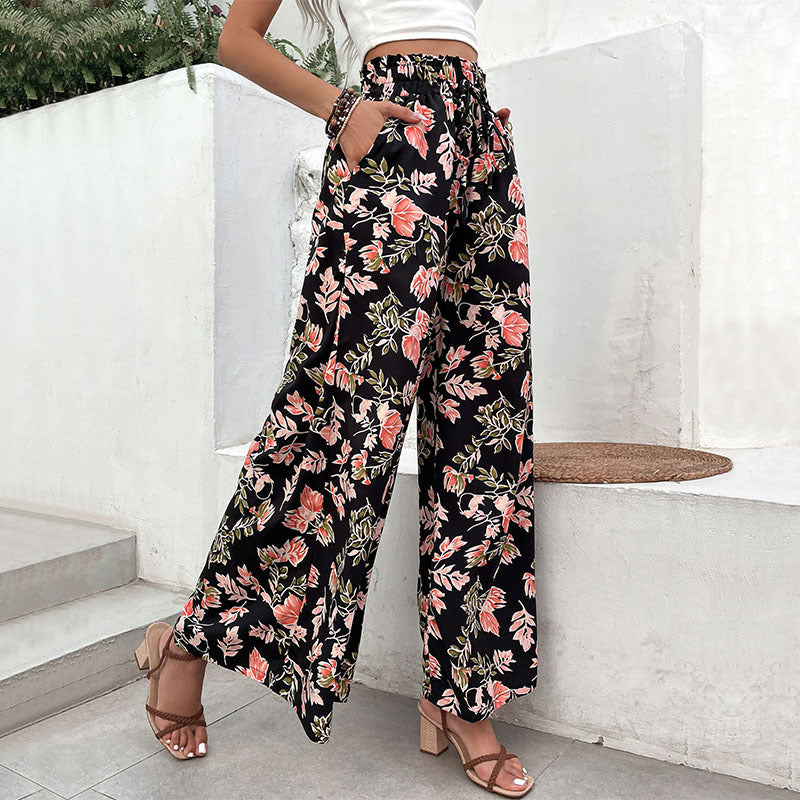 Pantalons palazzo pour femmes avec motif floral et taille élastique Chic & Stil