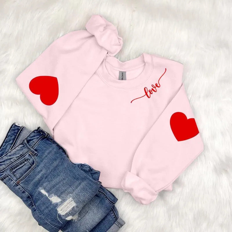 Sweatshirt femme avec design cœur et coupe décontractée Chic & Stil