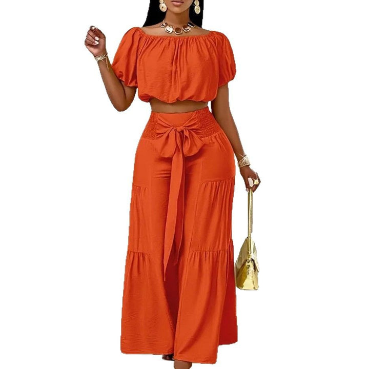 Woman Deep V-Neck Crop Top and High-Waisted Palazzo Pants Lune London