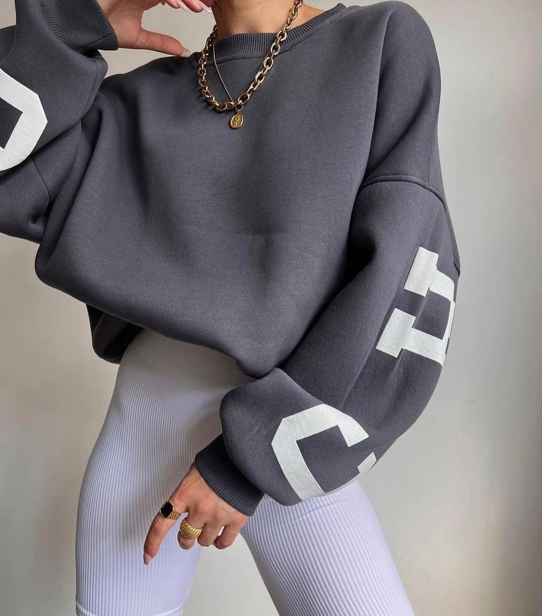 Ladies Oversized Sweatshirt with Chic Logo and Striking Style