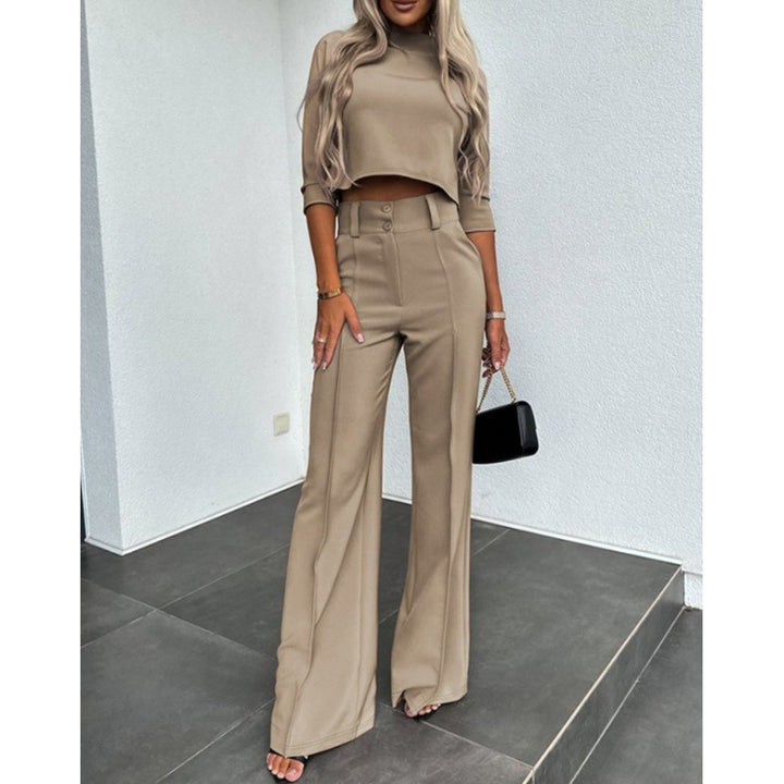 Woman trendy cropped top with elegant palazzo pants Lune London
