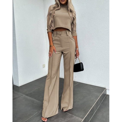 Woman trendy cropped top with elegant palazzo pants Lune London