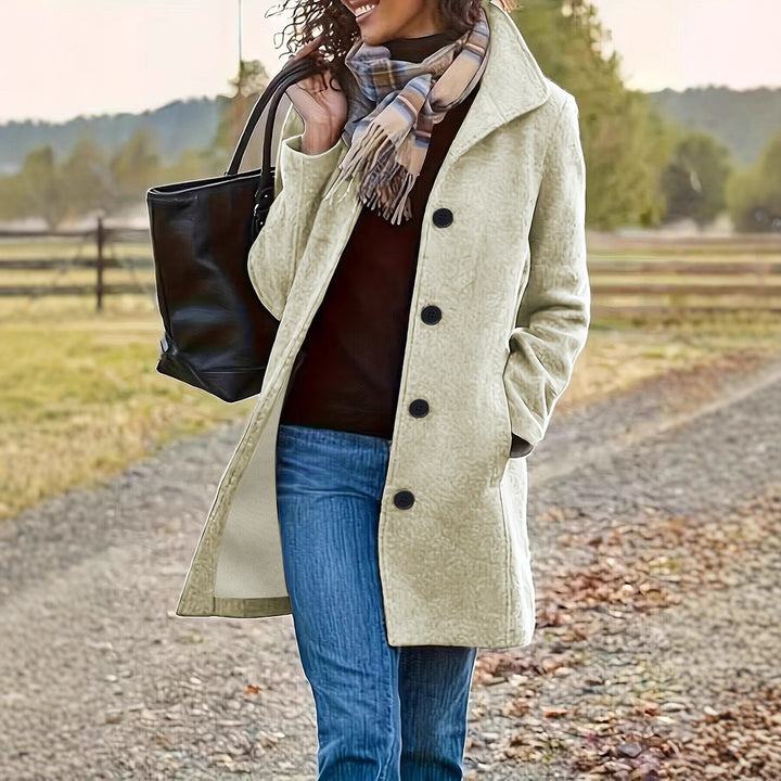 Manteau en laine élégant pour femmes avec col moderne et poches pratiques Chic & Stil