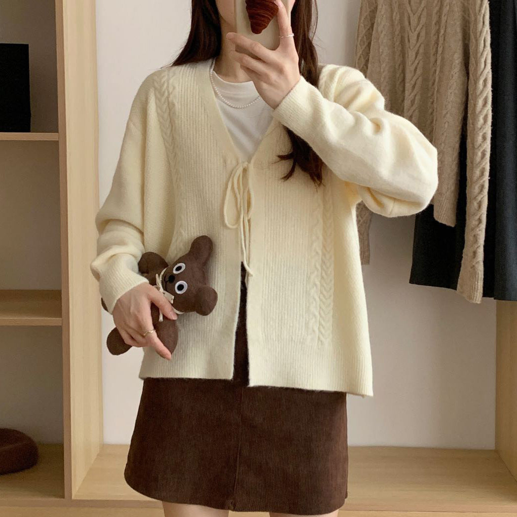 Women’s knit jacket with cable pattern and decorative drawstring Lune London