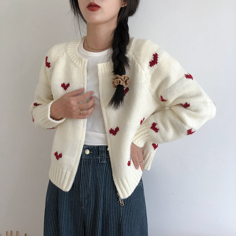 Ladies comfortable cardigan with heart pattern and chic style elegant button detail