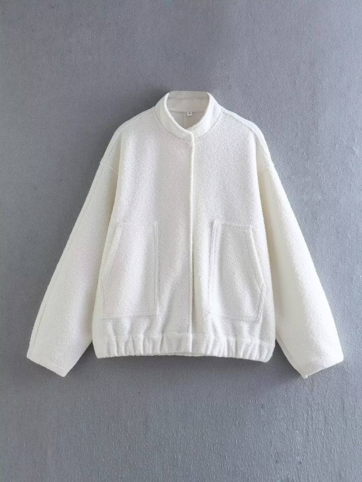 Oversized knit jacket for women in soft teddy fabric with a high collar and side pockets Lune London