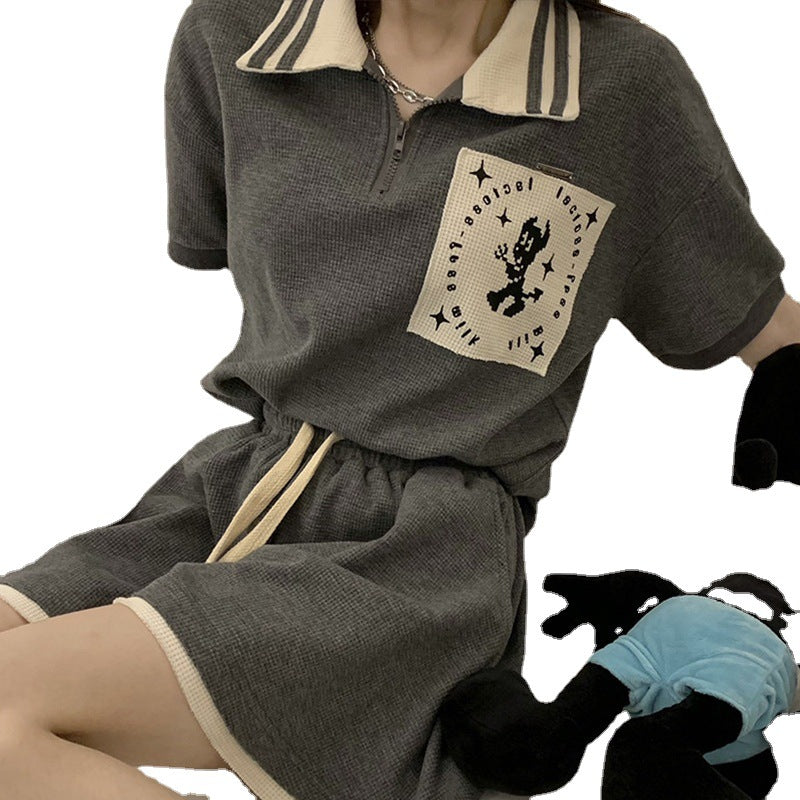 Women's Short Sleeve Polo Shirt with Modern Collar and Stylish Graphic Detail Lune London