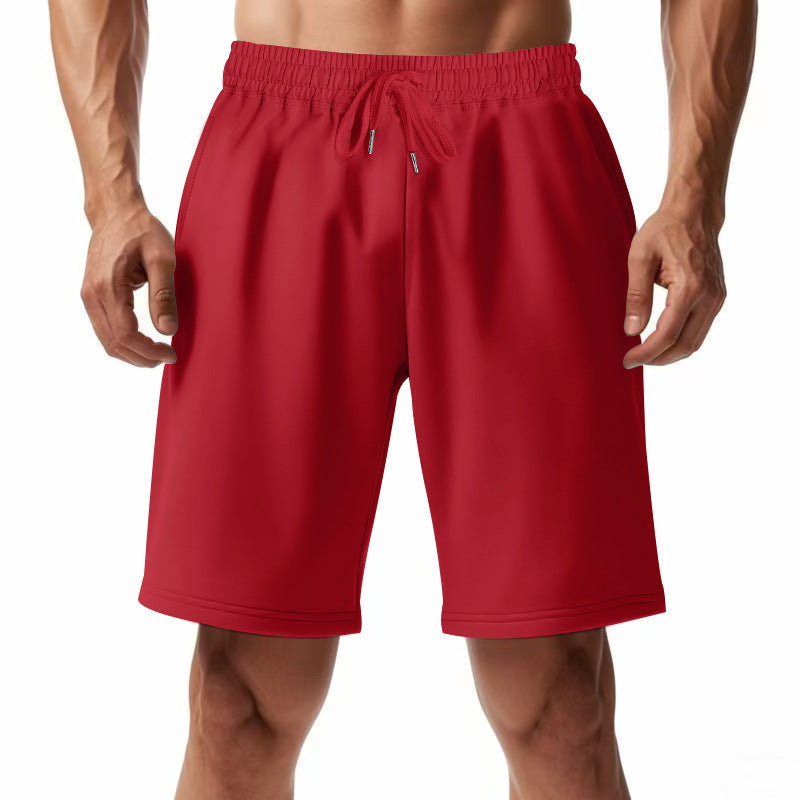 Breathable gym pants for men with elastic waistband and side pockets Lune London