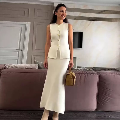 Women’s outfit including a sleeveless top with button details and a flared skirt Lune London