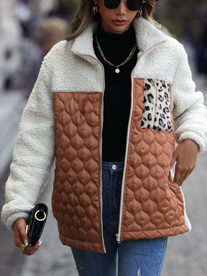 Women's fleece jacket with modern patchwork details and a chic animal print
