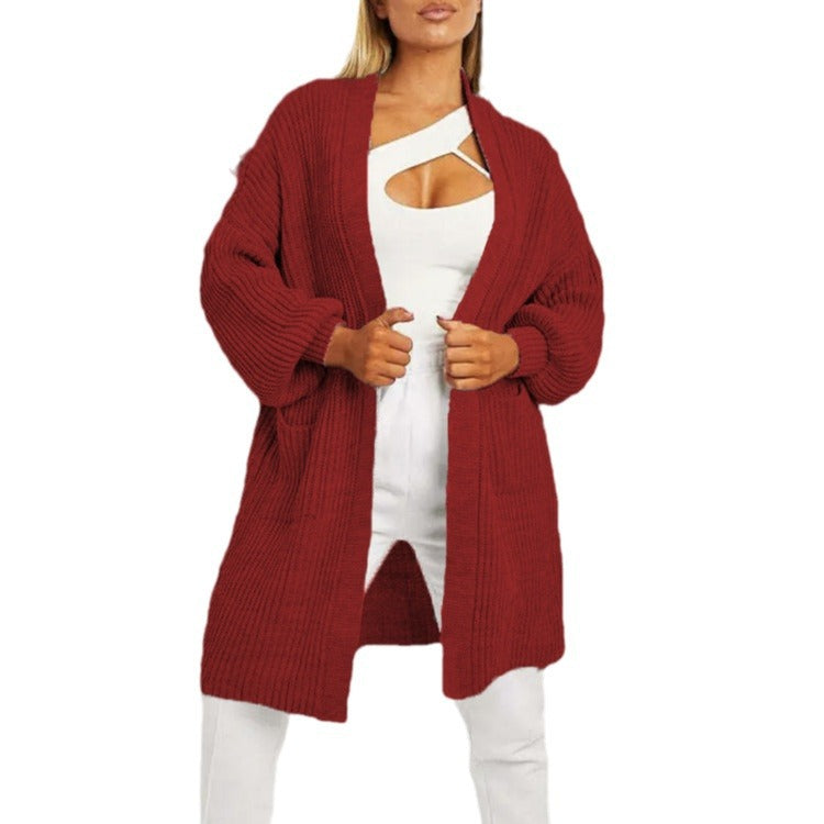 Ladies oversized knit cardigan with voluminous sleeves and open pockets Lune London