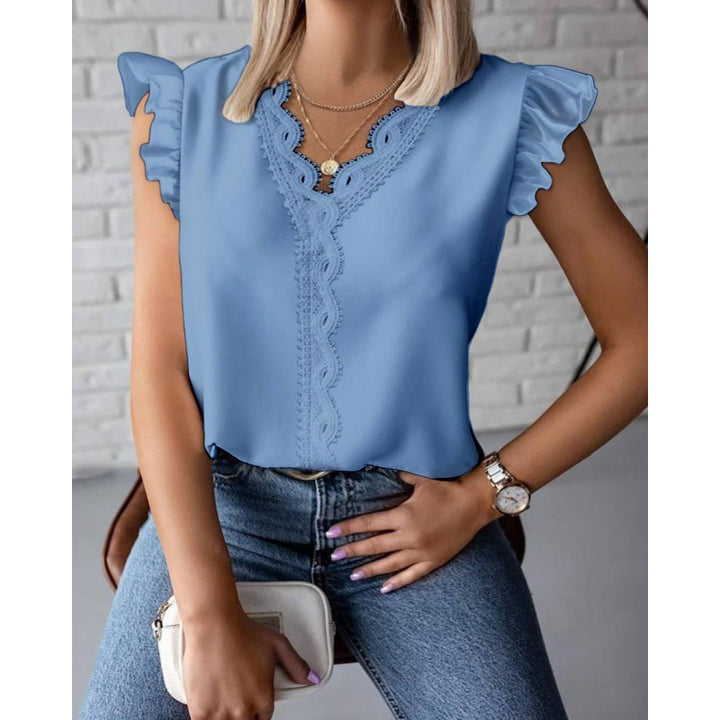 Women's blouse with ruffle details and lace appliqués Lune London