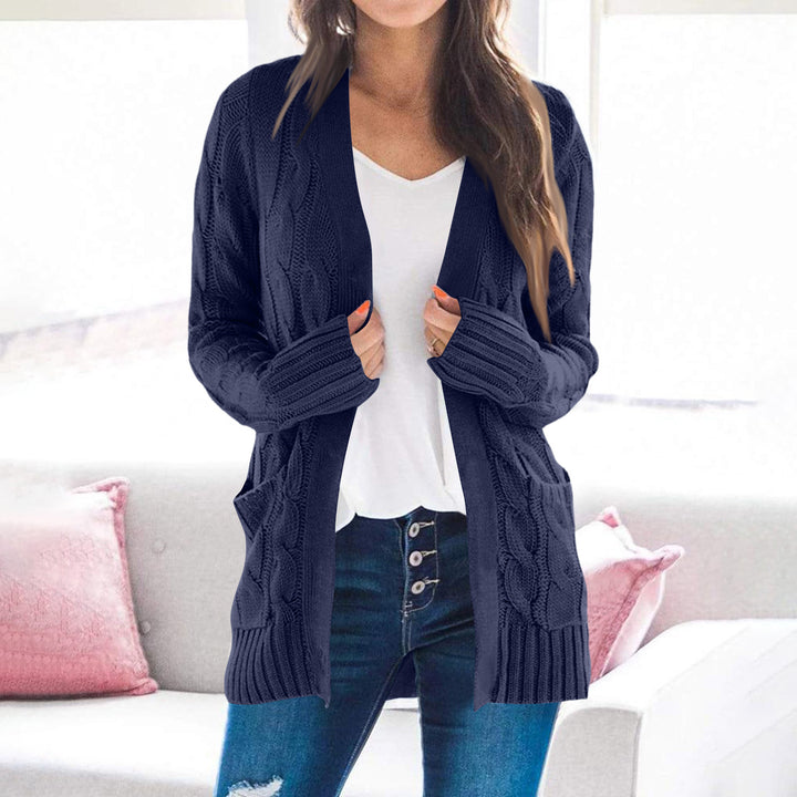 Thick knit jacket for women with modern cable patterns and practical pockets Lune London