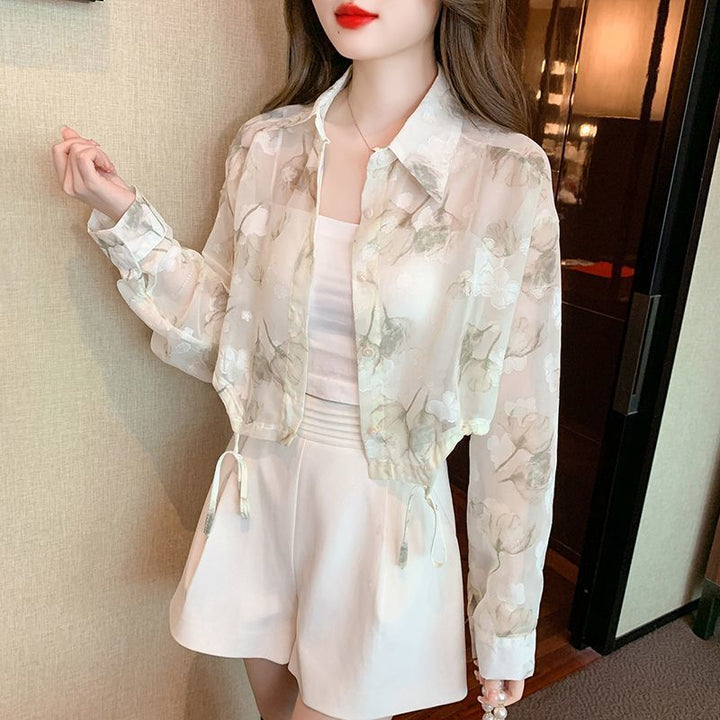 Blouse transparente pour femmes avec design floral Chic & Stil