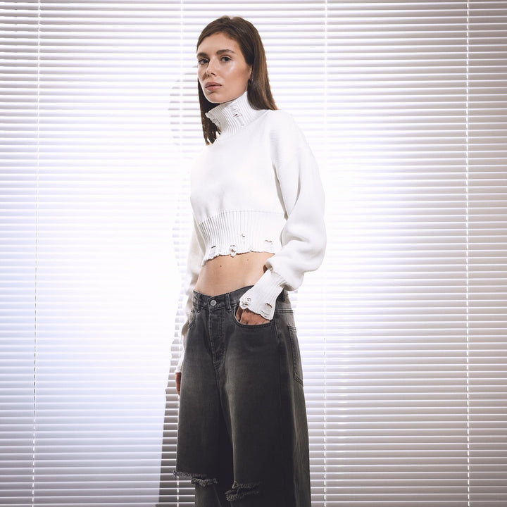 Trendy cropped sweater for women with a modern ribbed design and playful details Lune London