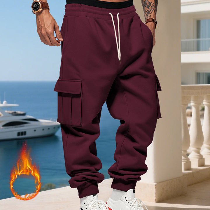 Men's cargo joggers with side pockets and elastic waistband. Chic and style.