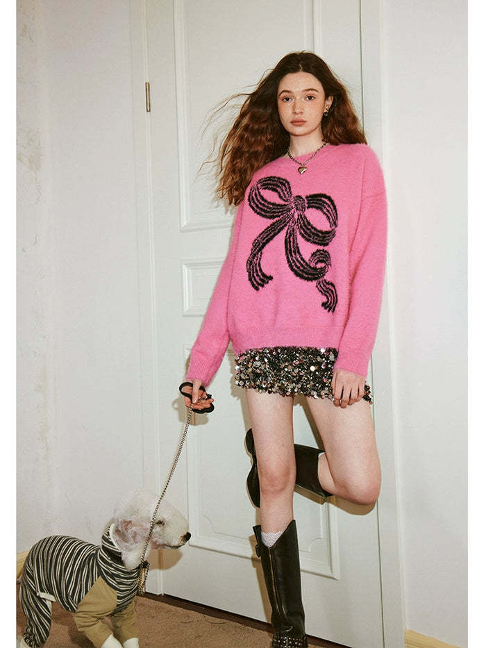 Pull femme avec motif nœud ludique et matière douce Chic & Stil