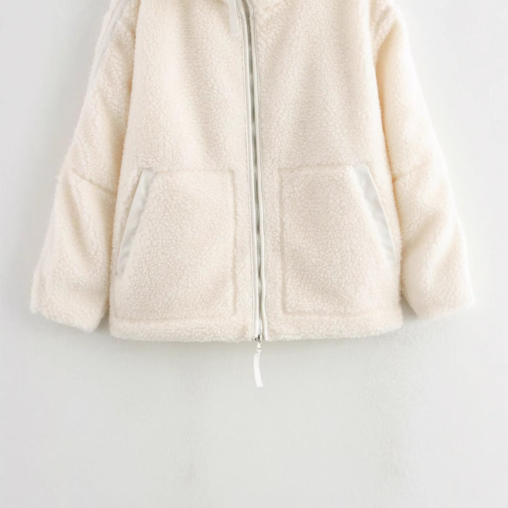Veste en polaire confortable pour femmes avec col montant et poches pratiques Chic & Stil