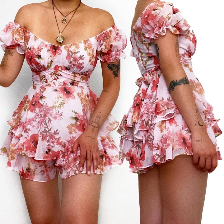Women's short sleeve overall with romantic floral pattern and flowing cut