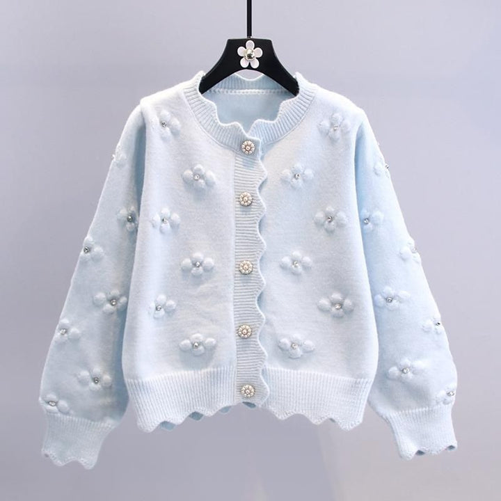 Cardigan féminin confortable avec des appliqués floraux Chic & Stil