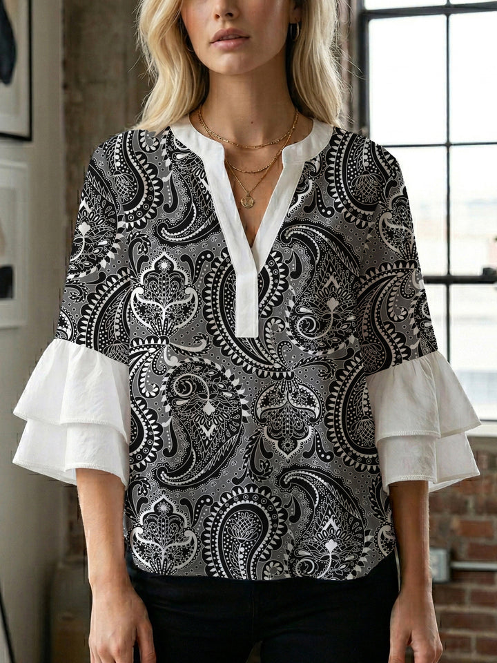 Women's blouse with voluminous wing sleeves and intense leaf pattern Lune London